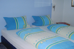 Hotelbett im Hotel Zweng in Kitzingen Hotel Kitzingen - Hotelbett
