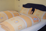 Hotelbett im Hotel Zweng in Kitzingen Hotel Kitzingen - Hotelbett