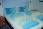 Hotelbett im Hotel Zweng in Kitzingen Hotel Kitzingen - Hotelbett